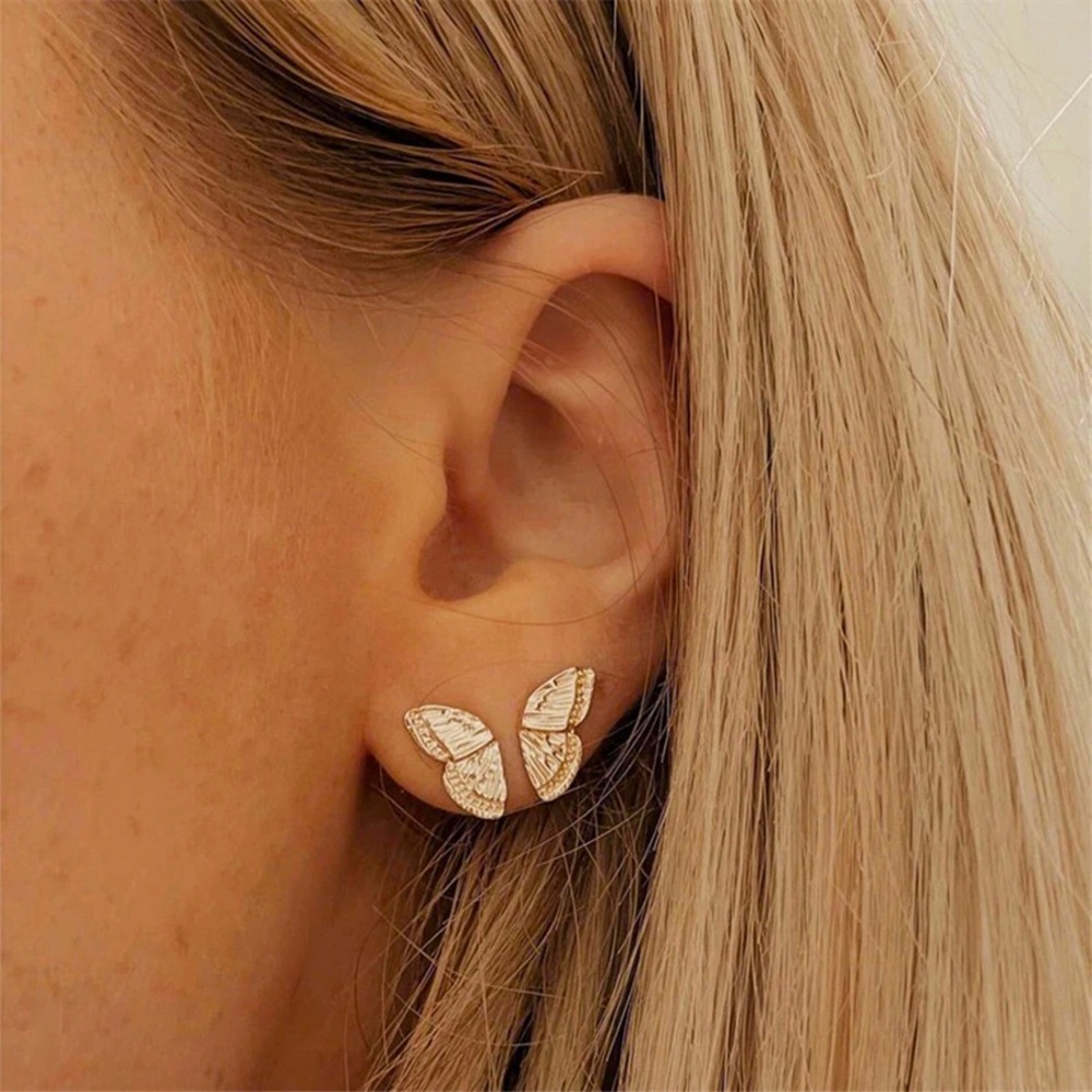 Gold textured double wing half butterfly stud earrings